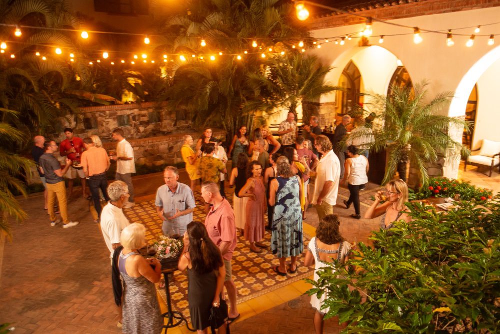 view of people in the Inn courtyard of rancho santana beach resort
