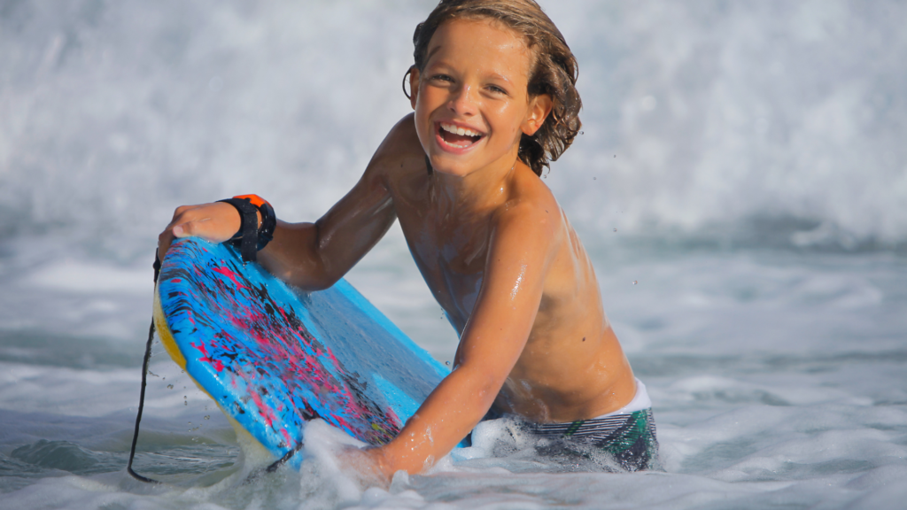 BodyBoarding Kid in the ocean in Nicaragua. 