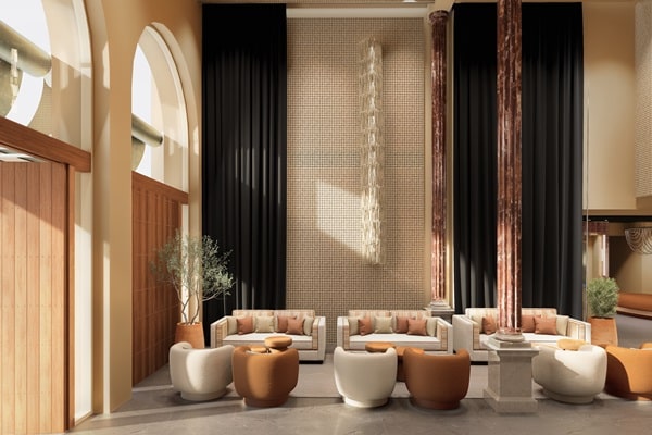 Modern lounge area with beige sofas, round tan and white chairs, marble columns, and tall black curtains—an elegant space that embodies the sophisticated style of 2026 luxury travel trends. Natural light fills the room through large arched windows.